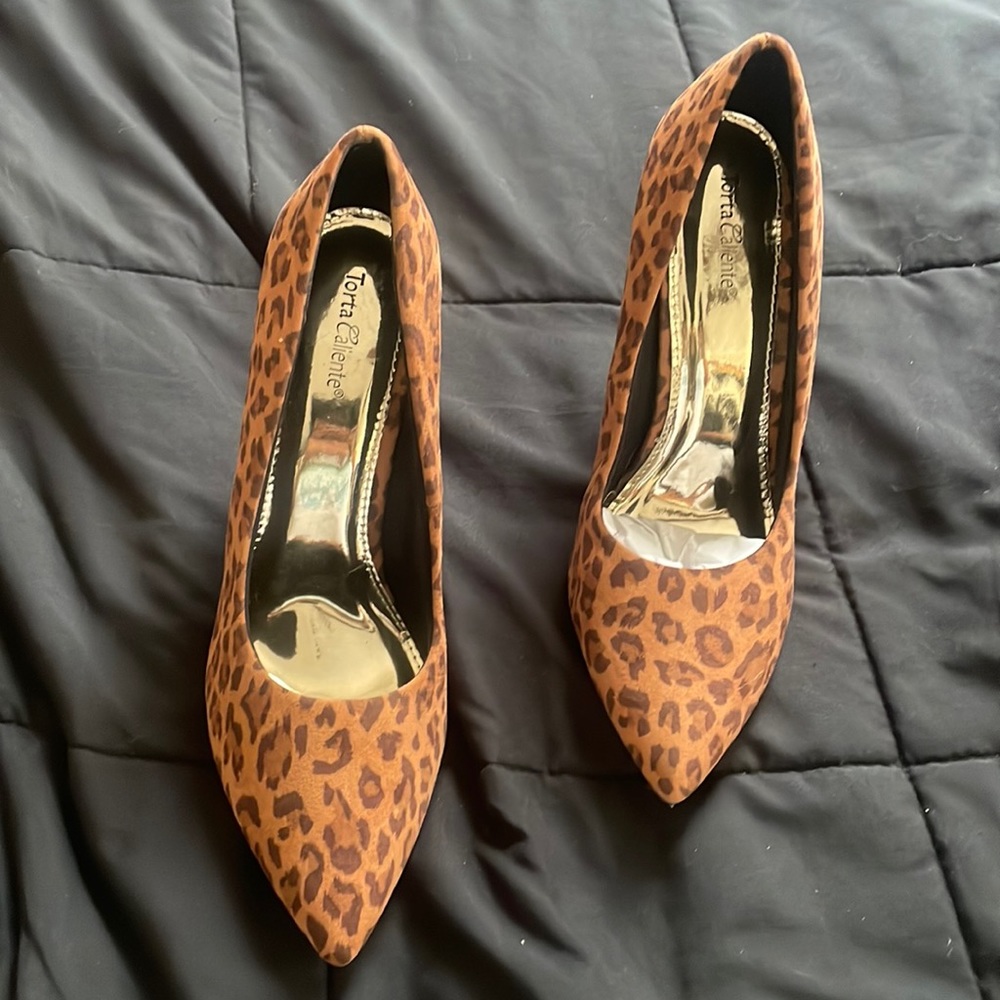 Leopard pumps . Brand new without box